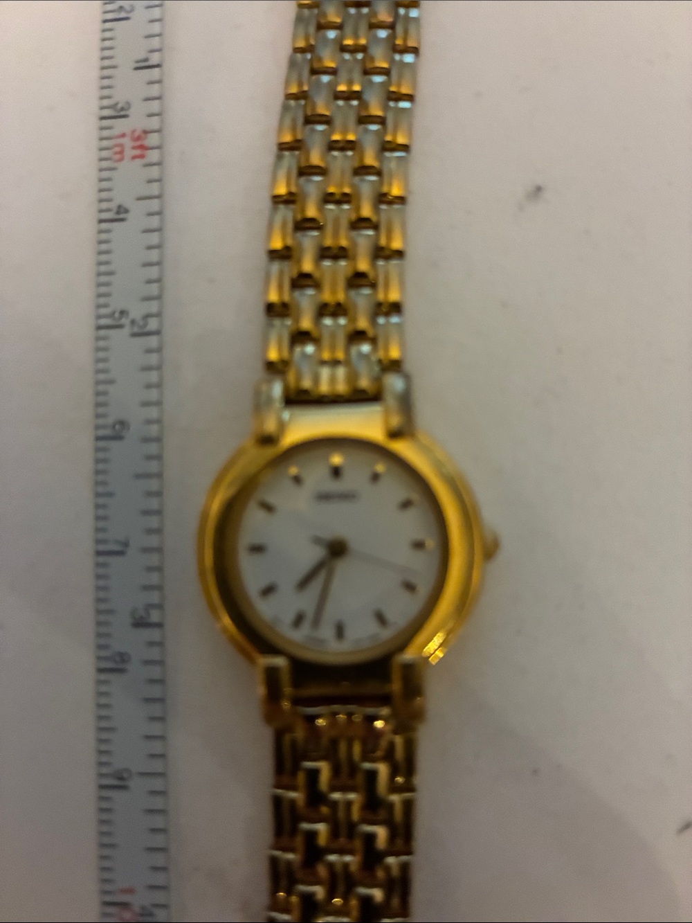 Seiko Gold Tone Women's Bracelet Watch with White Dial and Gold Markers